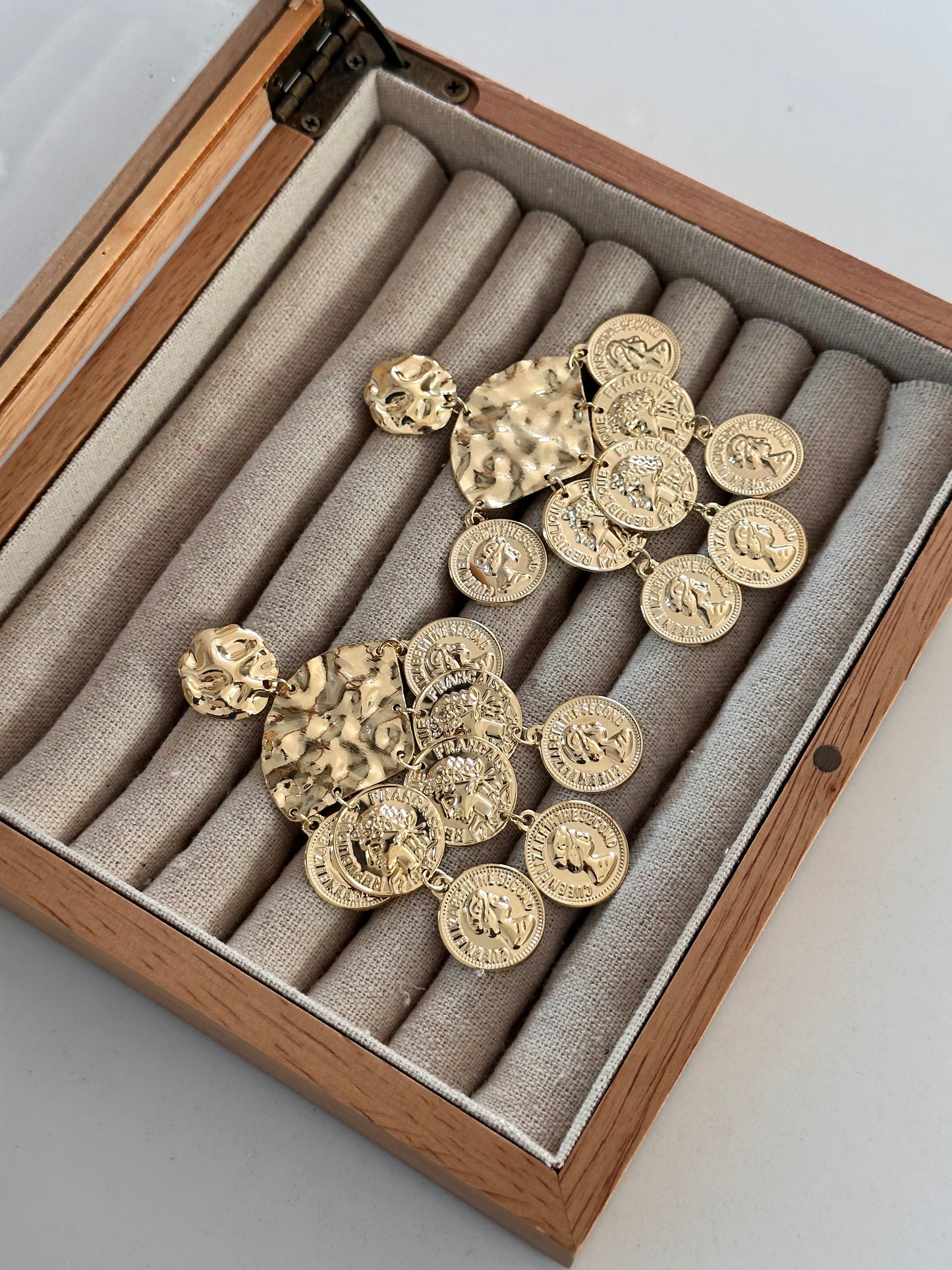 Pendientes Moneda