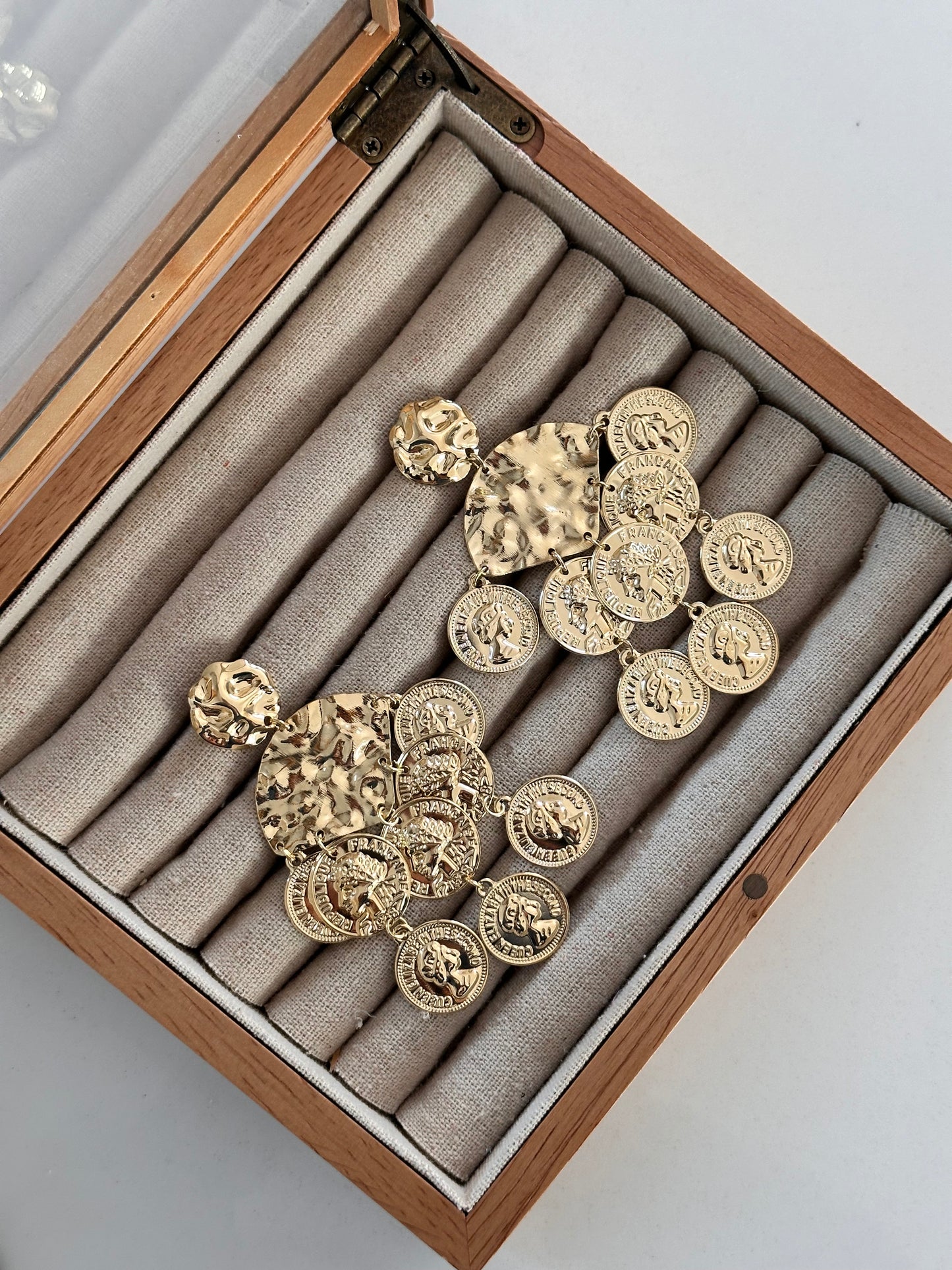 Pendientes Moneda