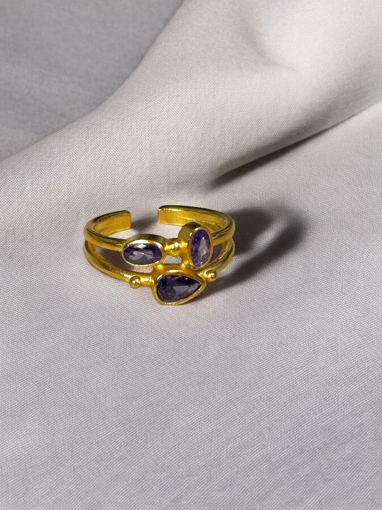 Anillo trío cristal circonita morado