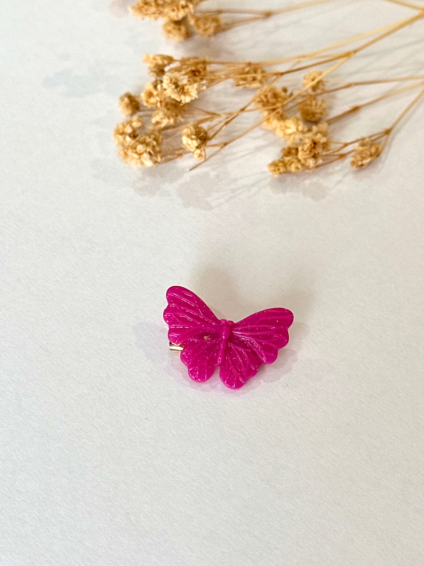 Broche mariposa niña buganvilla