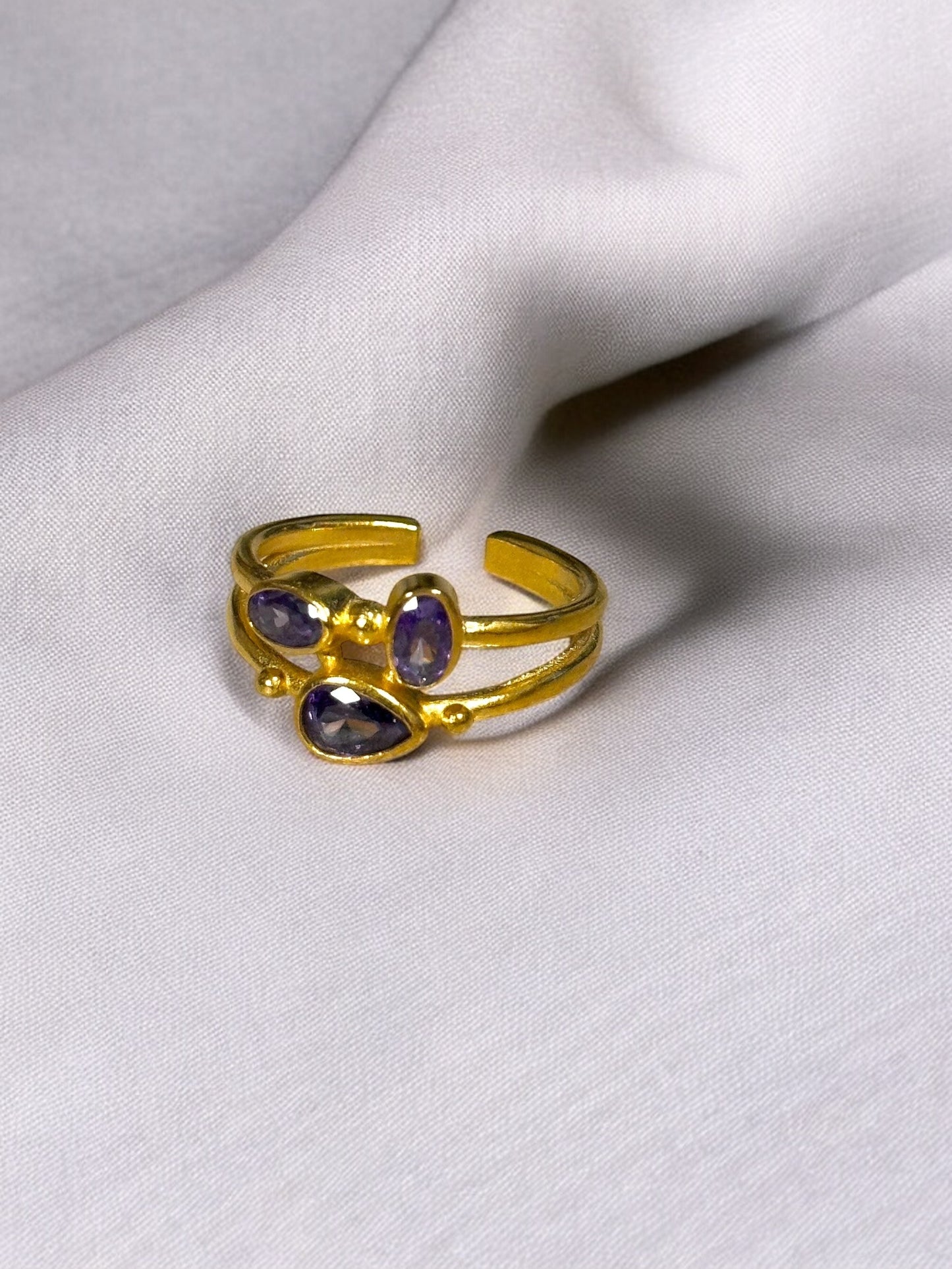 Anillo trío cristal circonita morado