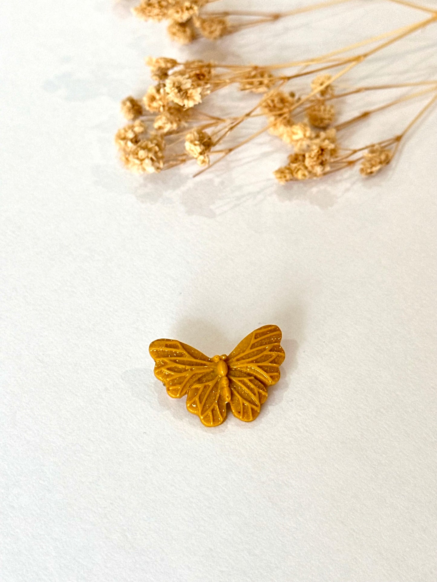 Broche mariposa niña albero