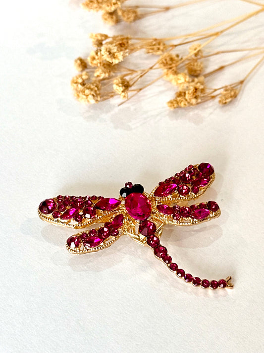 Broche libélula fucsia