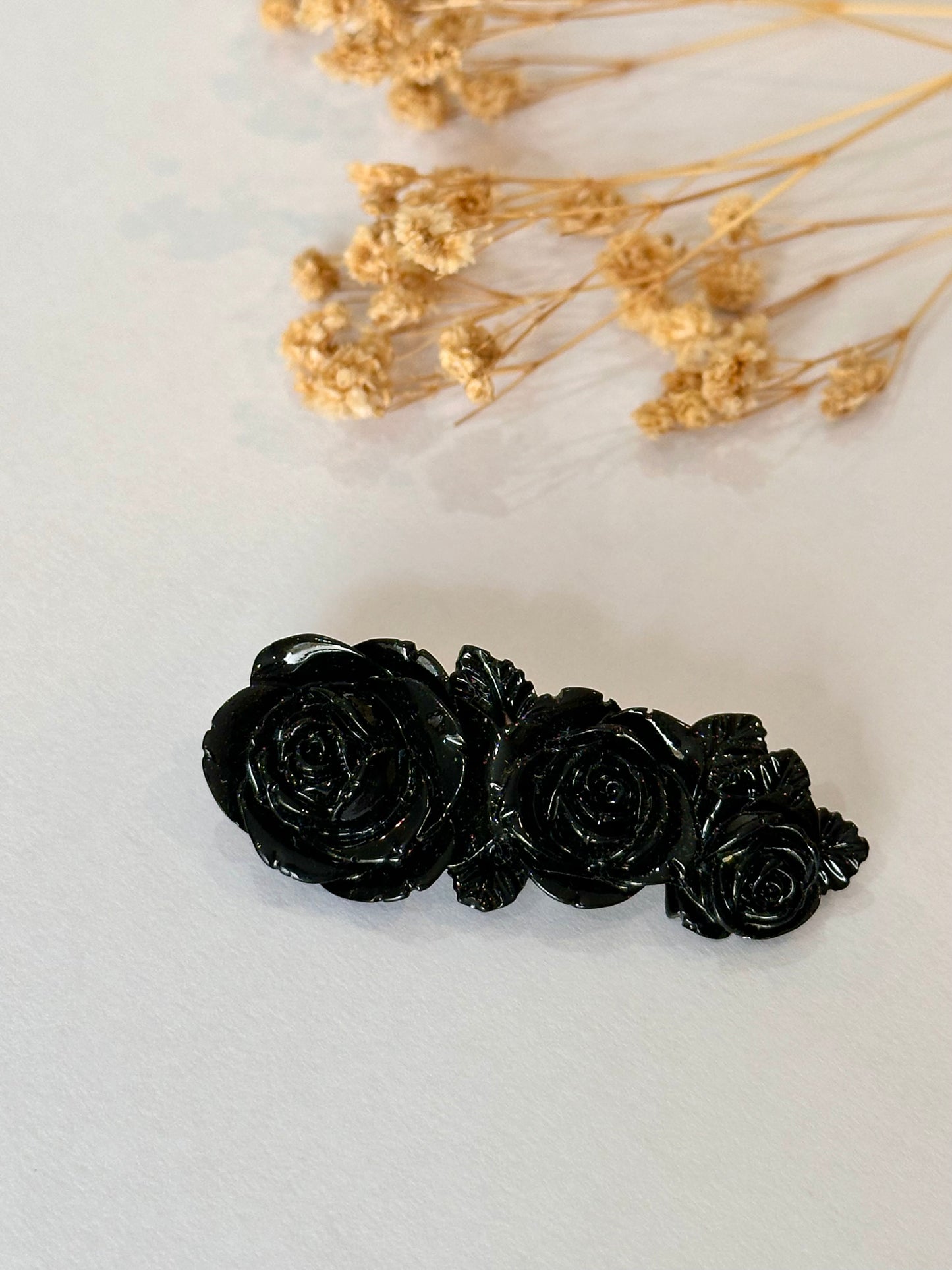 Broche rosetta negro