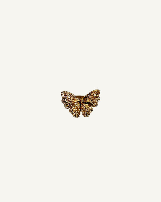 Broche mariposa niña