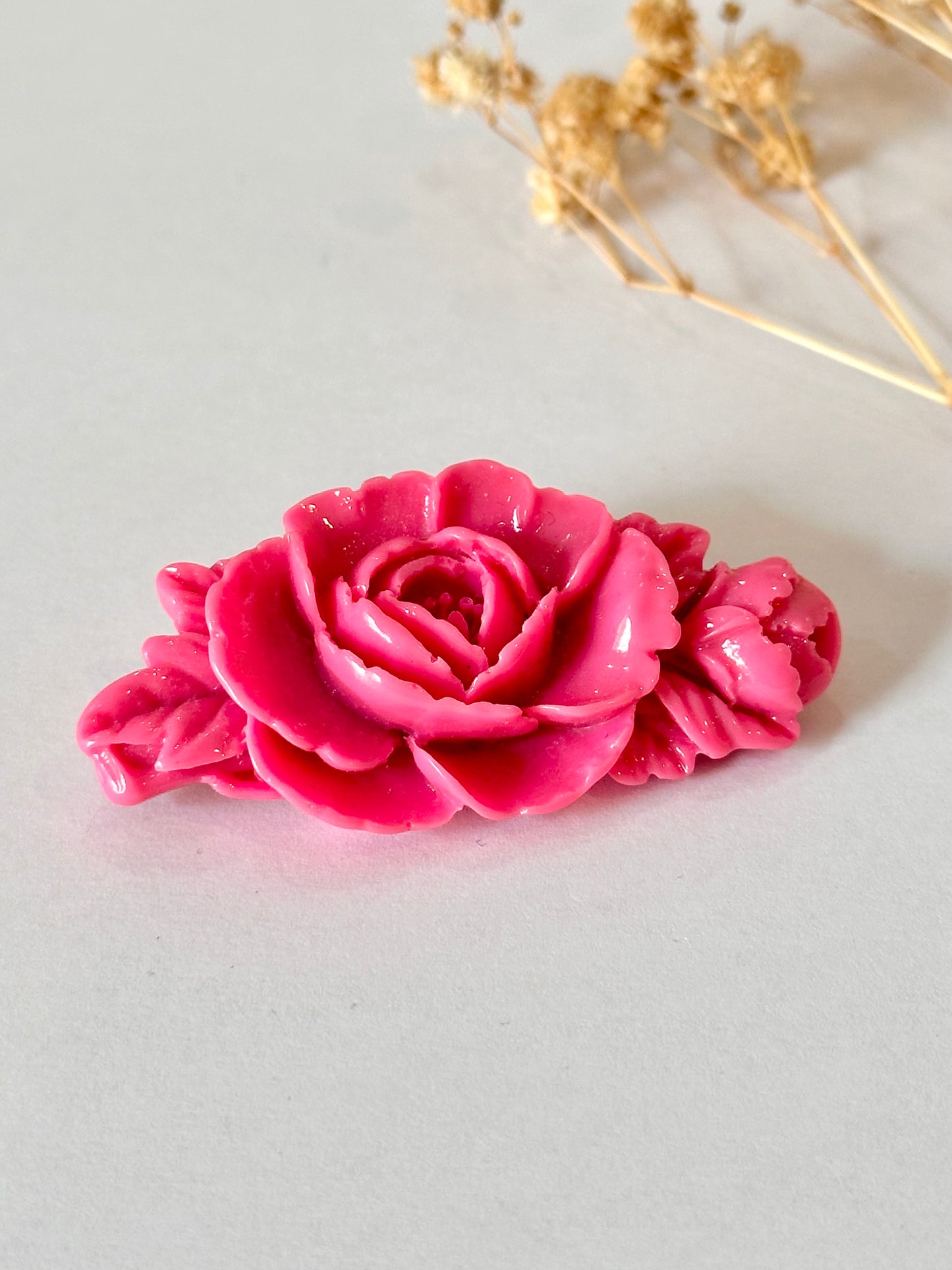 Broche rosa fucsia