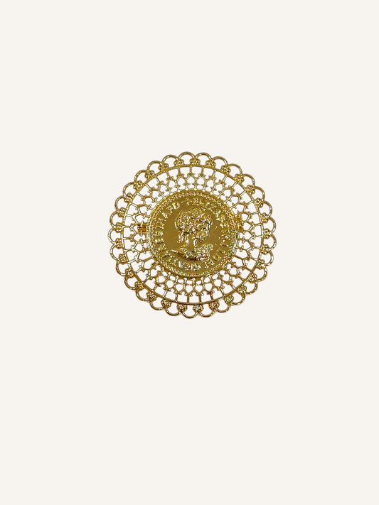 Broche moneda