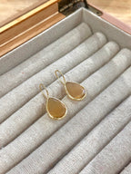 Pendiente lagrima tierra