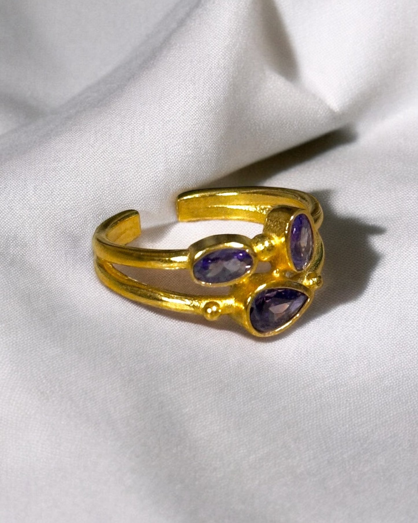 Anillo trío cristal circonita morado