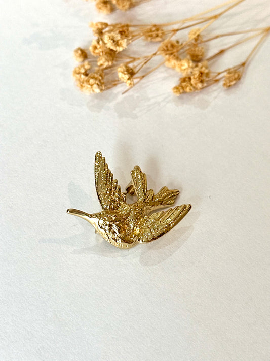 Broche golondrina