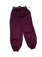 Pantalón satinado bombacho granate