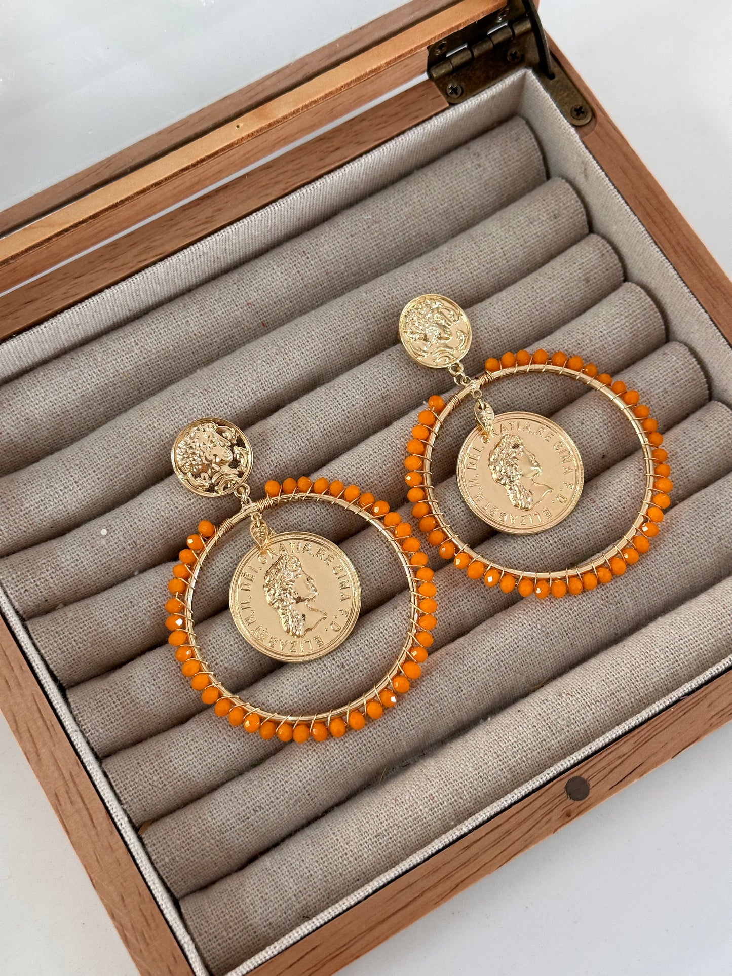 Pendientes moneda naranja