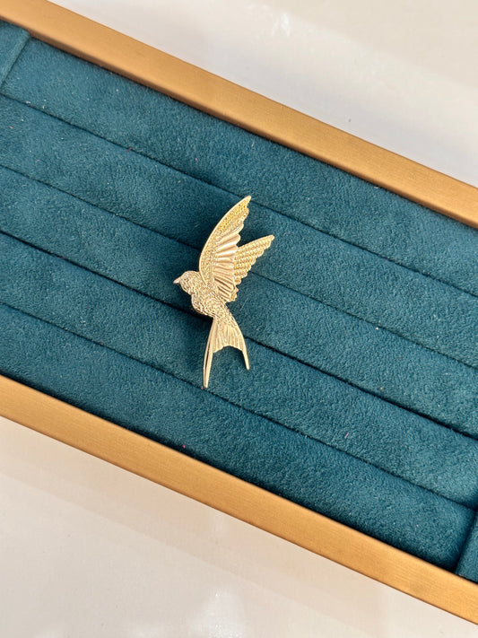 Broche golondrina